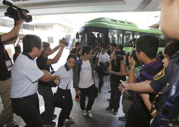 Relatives arrive in Kuala Lumpur. Picture: AP