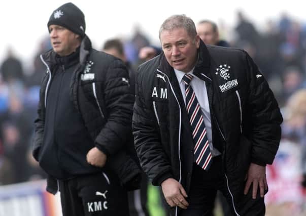 Ally McCoist, left, issues instructions from the dugout during Rangers win at Arbroath. Picture: SNS