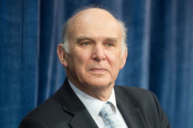 Vince Cable said disposal made the Royal Mails future safe. Picture: AFP/Getty