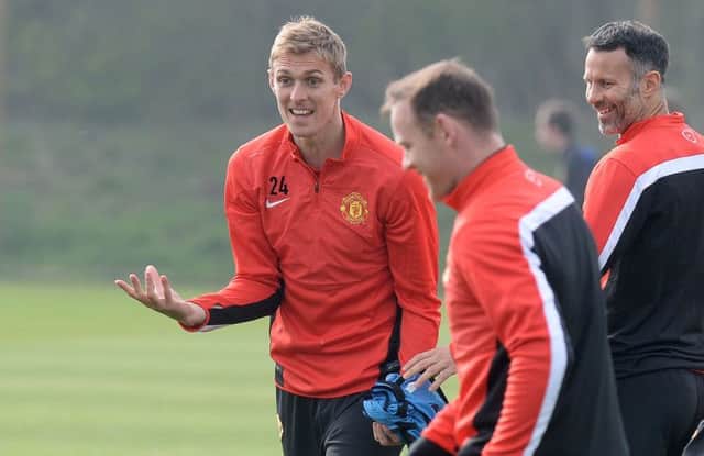 Darren Fletcher gets smiles out of Wayne Rooney and Ryan Giggs as United prepare to take on Bayern Munich. Picture: PA