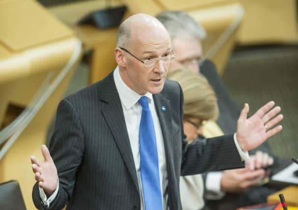 John Swinney has slammed the UK government over threats to rule out a currency union. Picture: Ian Georgeson