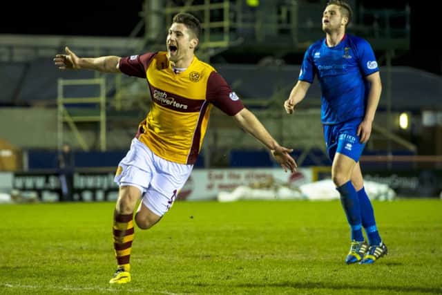 Motherwell ace Iain Vigurs celebrates after scoring his side's second goal of the game. Picture: SNS