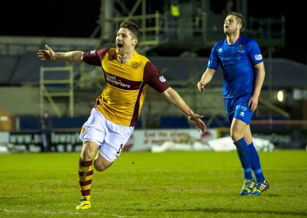 Motherwell ace Iain Vigurs celebrates after scoring his side's second goal of the game. Picture: SNS