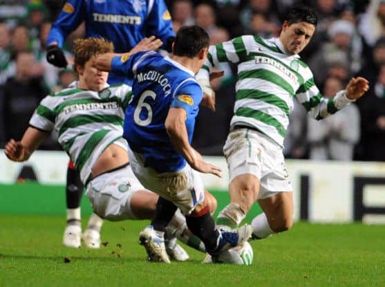Rangers Lee McCulloch tackles Beram Kayal. Picture: Ian Rutherford