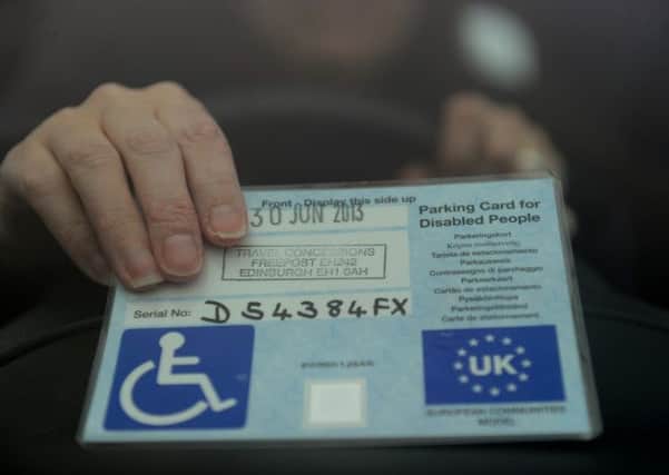 A disabled driver's blue badge. Picture: Neil Hanna