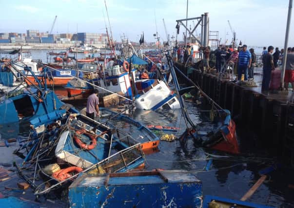 The earthquake damaged and destroyed fishing boats in Iquique, in northern Chile. Picture: AFP/Getty
