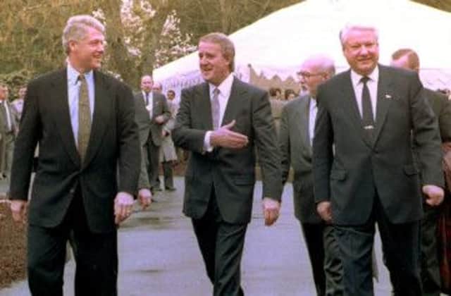 The then US and Russian presidents, Bill Clinton, left, and Boris Yeltsin, right, with Canadian premier Brian Mulroney in 1993. Picture: Getty