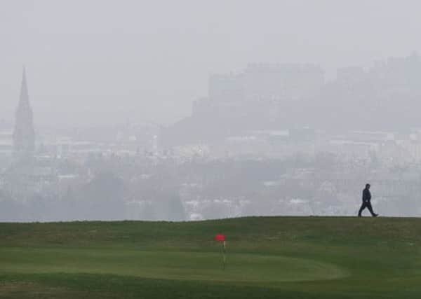 A view of the smog enveloping Edinburgh from the Braid Hills. Picture: Neil Hanna