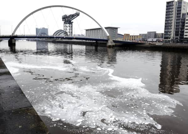 Foam has mysteriously appeared in the river. Picture: John Devlin