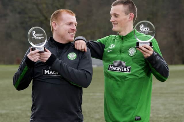Neil Lennon, left, and Liam Henderson show off their SPFL awards at Lennoxtown yesterday. Picture: SNS