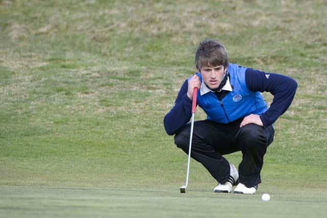 Bradley Neil lines up a putt. Picture: Kenny Smith