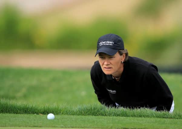 Catriona Matthew of Scotland lines up a long putt. Picture: Getty