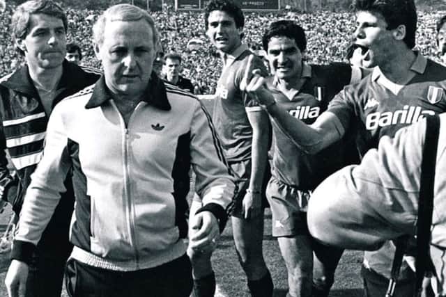 Jim McLean is abused by animalistic Roma players after the full-time whistle at the Stadio Olimpico. Picture: Complimentary