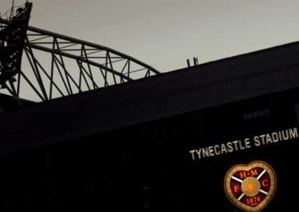 Tynecastle, with the pong from the nearby brewery  once breweries  hanging over it, is part of Edinburghs soul  even to diehard Hibernian supporters. Photograph: Neil Hanna
