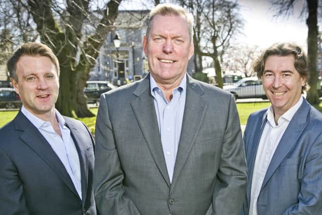 Tom Smith, centre, joins David Greenwood, right, and Derek Munro. Picture: Contributed