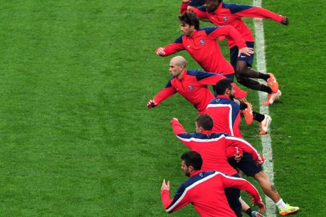 Paris St-Germain players go through their paces at Stamford Bridge. Picture: Getty