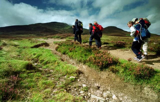 230,000 walkers hike up Scotlands mountains every month. Picture: TSPL
