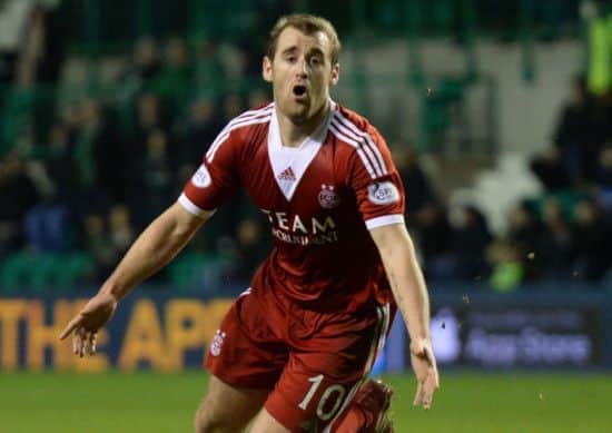 Niall McGinn celebrates his and Aberdeens second in their 2-0 win at Easter Road. Picture: SNS