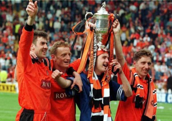 Craig Brewster (left), Dave Bowman, David Hannah and Jim McInally celebrate Dundee Uniteds victory in 1994. Picture: SNS