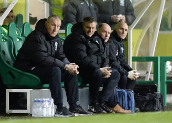 Terry Butcher cut a dejected figure with his management team during the clubs latest defeat on Monday. Picture: SNS