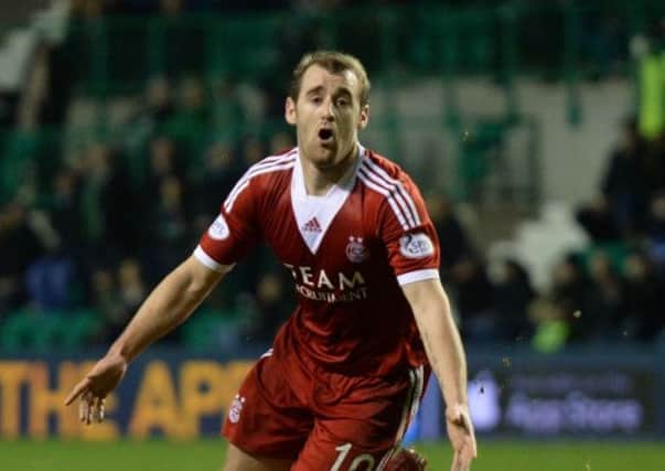 Niall McGinn celebrates after scoring his second goal of the match. Picture: SNS