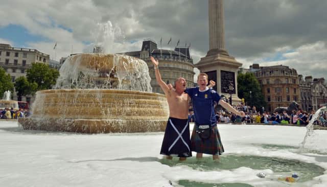 Two members of the Tartan Army get stocious before a game against England at Wembley Picture: TSPL