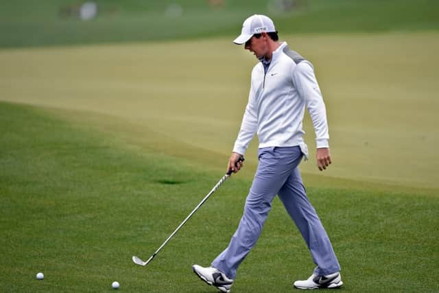 Rory McIlroy works on his short game during a practice round at Augusta National. Picture: Getty