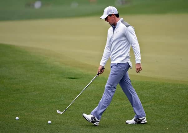 Rory McIlroy works on his short game during a practice round at Augusta National. Picture: Getty