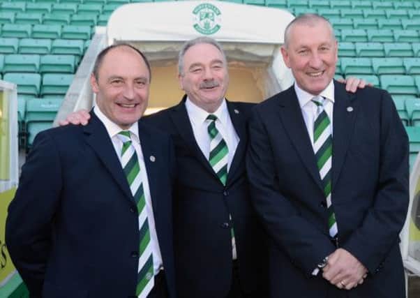 Hibs chairman Rod Petrie (C) with manager Terry Butcher (R) and assistant Maurice Malpas (L). Picture: Neil Hanna