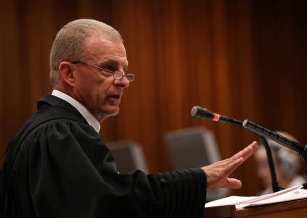Prosecutor Gerrie Nel opened by urging Pistorius to accept responsibility for fatal shooting.  Picture:Getty