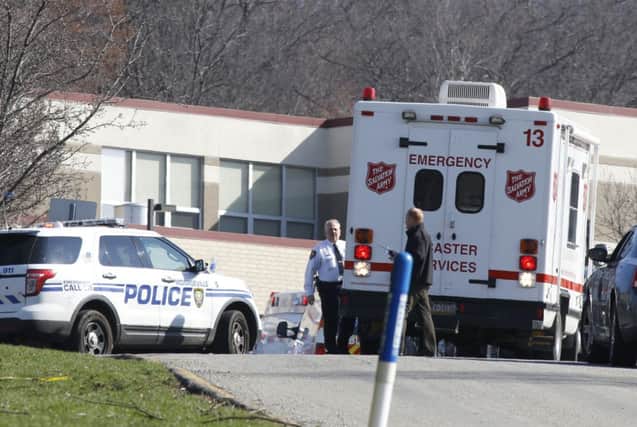 Emergency responders gather were several people where stabbed at Franklin Regional High School. Picture: AP
