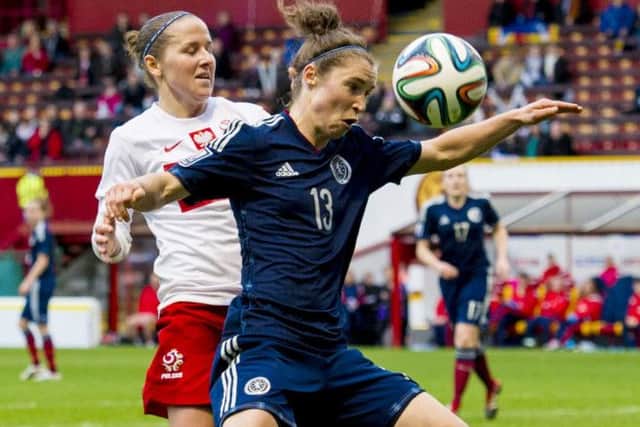 Scotlands Jane Ross holds off the challenge of Polands Natalia Chudzik at Fir Park. Picture: SNS