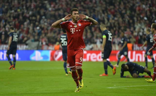 Bayern Munich's Croatian striker Mario Mandzukic celebrates his equaliser. Picture: Getty