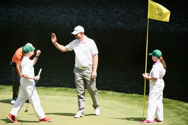 Stephen Gallacher with his daughter Ellie and son Jack. Picture: Getty