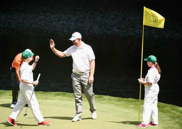 Stephen Gallacher with his daughter Ellie and son Jack. Picture: Getty