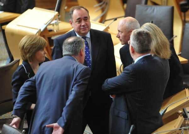 Alex Salmond with fellow MSP's. Picture: Lesley Martin