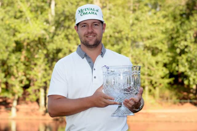 Par-three champions curse? Ryan Moore poses with the trophy. Picture: Getty