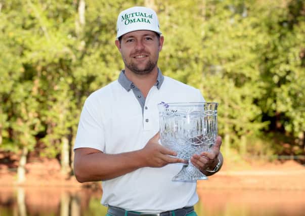 Par-three champions curse? Ryan Moore poses with the trophy. Picture: Getty