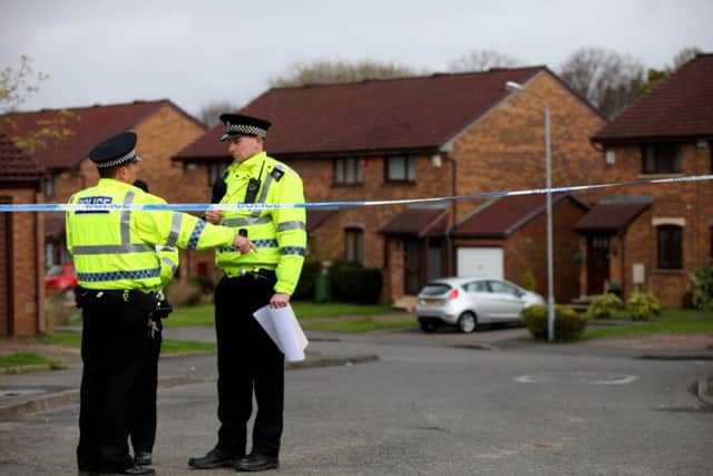 Police at the scene of the murder at Raeswood Drive. Picture: Hemedia