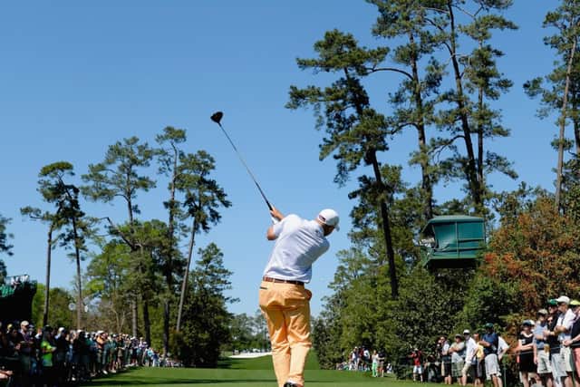 Bill Haas of the United States hits his tee shot on the 18th. Picture: Getty