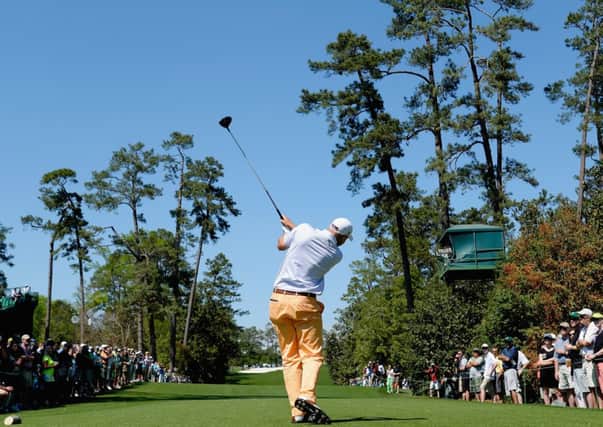 Bill Haas of the United States hits his tee shot on the 18th. Picture: Getty