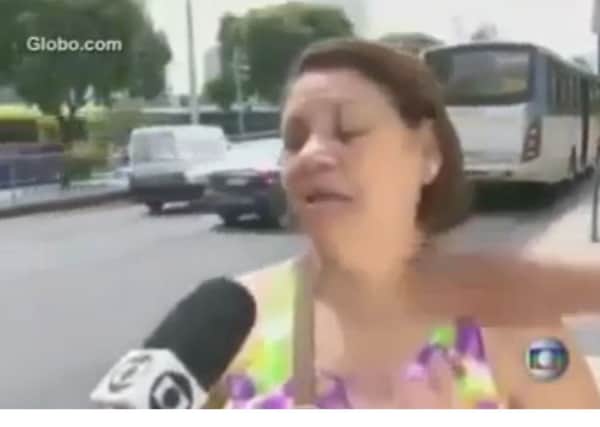 A still from the footage which shows a woman being mugged during a TV interview. Picture: TV Globo