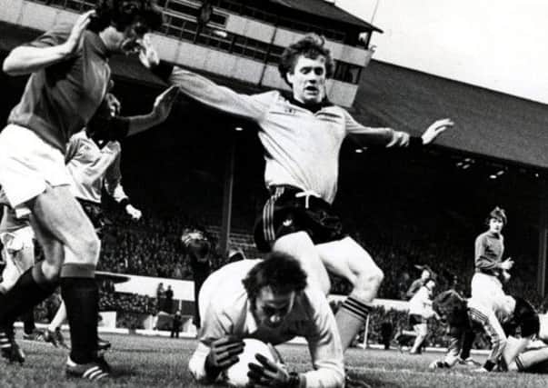 Rangers goalkeeper Peter McCloy saves as Billy Kirkwood rushes in, with Sandy Jardine in attendanc. Picture: Daily Record