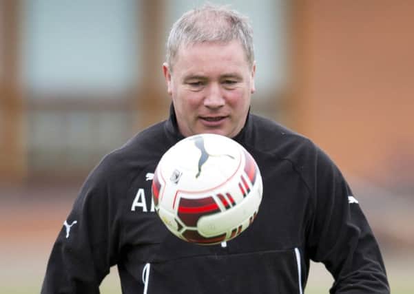 Ally McCoist plays keepie-uppie yesterday during training for todays Scottish Cup semi-final. Picture: SNS