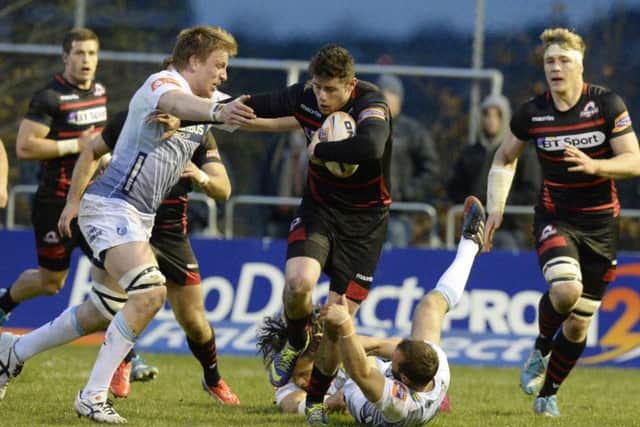 Jack Cuthbert, centre, tries to evade Cardiffs Macauley Cook and Gareth Davies. Picture: SNS Group/SRU