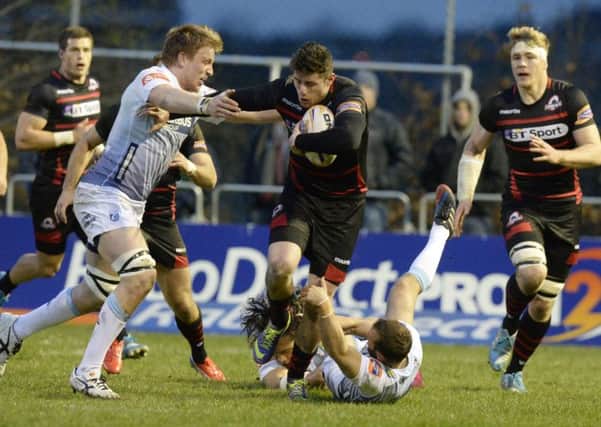 Jack Cuthbert, centre, tries to evade Cardiffs Macauley Cook and Gareth Davies. Picture: SNS Group/SRU