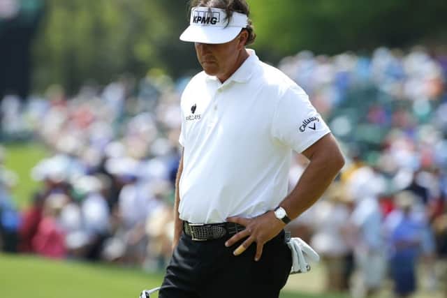 U.S. golfer Phil Mickelson reacts after a missed putt on the sixth hole. Picture: Reuters