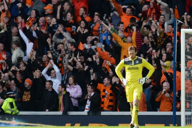 A despondent Steve Simonsen after Nadir Ciftci scores Dundee Utd's third goal of the game. Picture: SNS