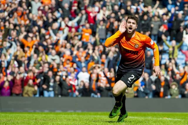Nadir Ciftci celebrates after scoring his side's third goal of the game. Picture: SNS