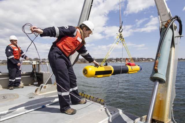 A Bluefin Robotics submersible like the one pictured is being used in the search. Picture: AP